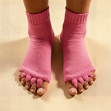 Chaussettes d'alignement Pedi-Sense rose bonbon aux pieds